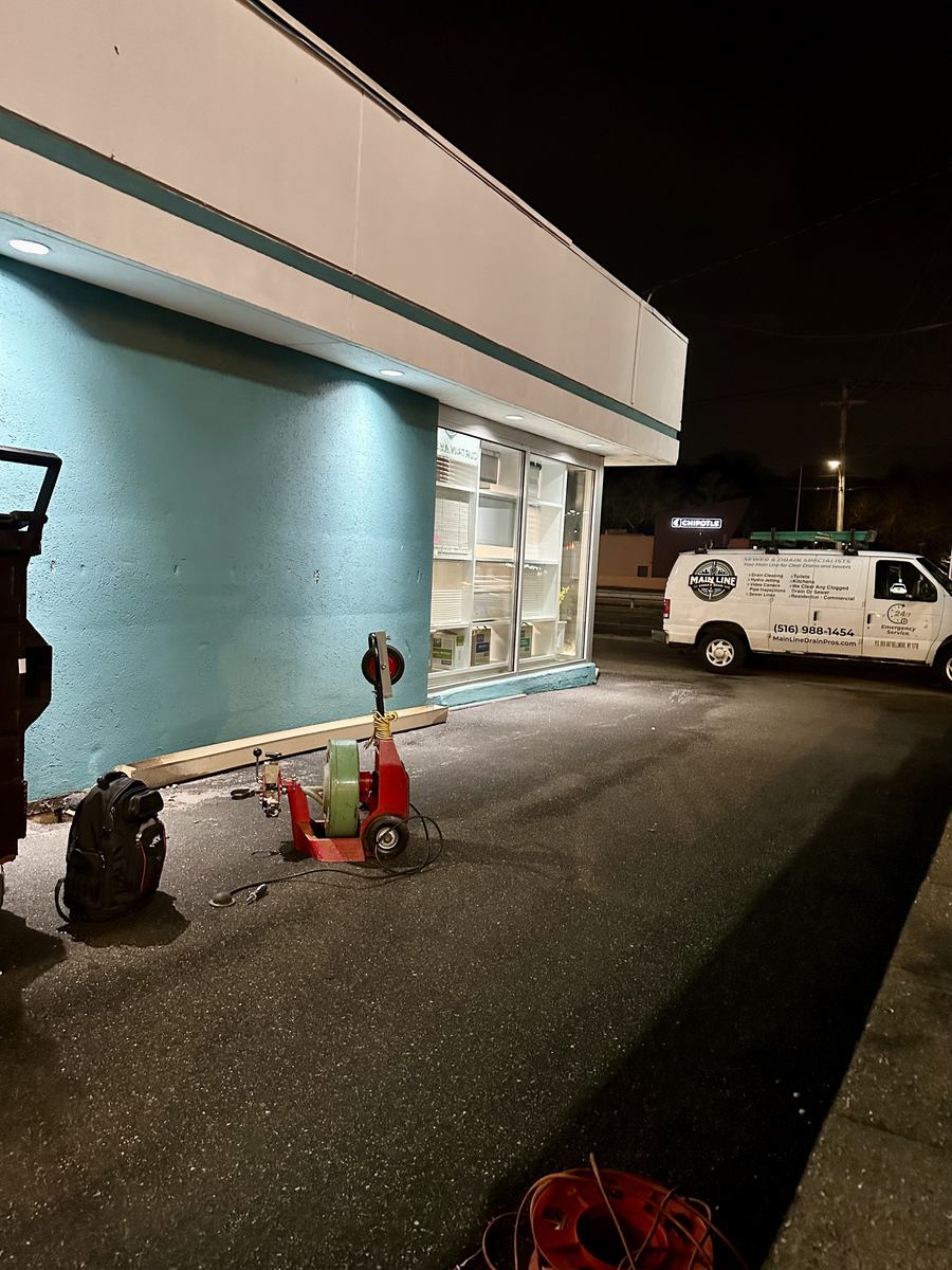 Main Line sewer camera and cable reel set up outside a building for an inspection